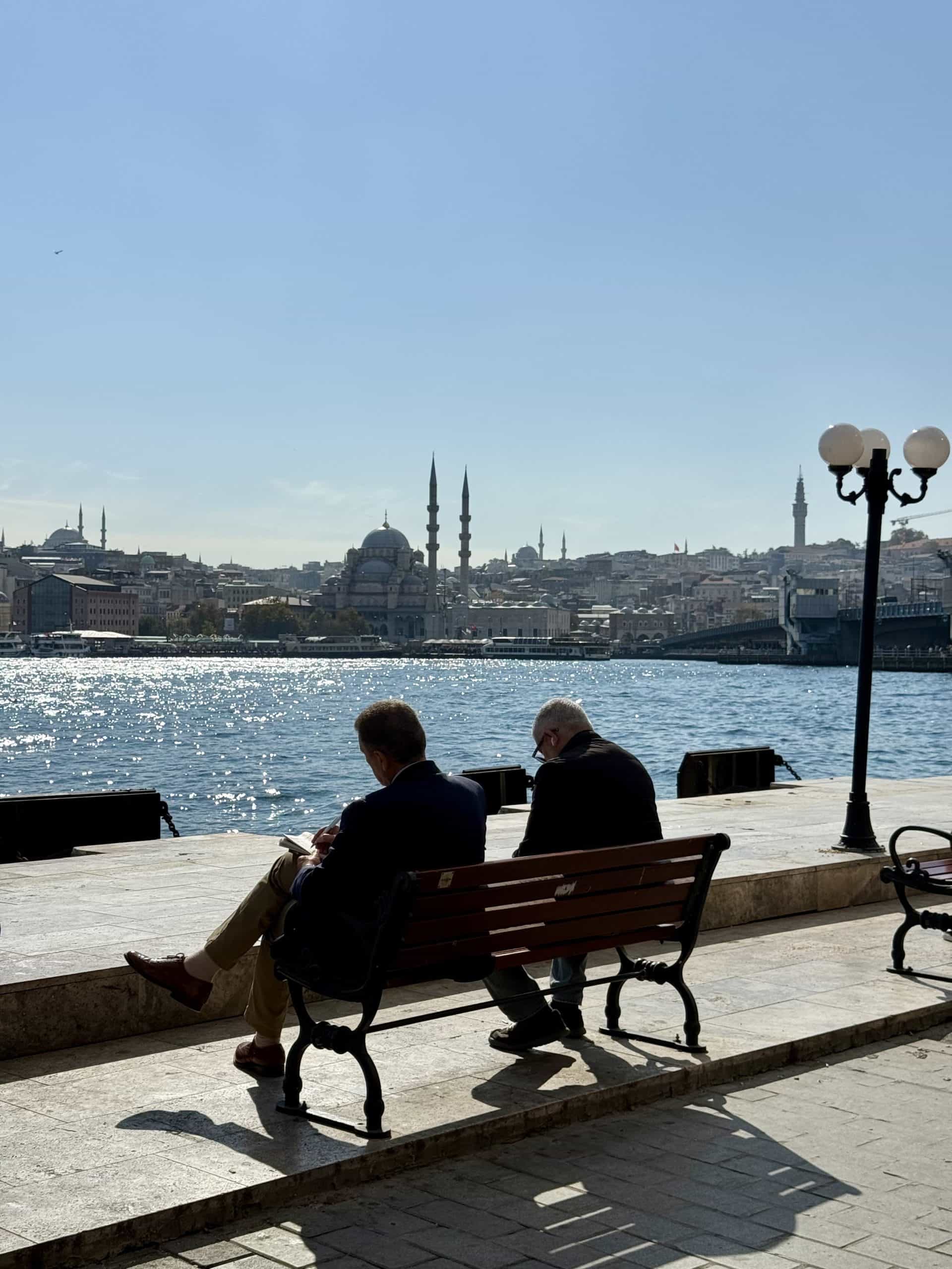 Men reading the paper on the Karakoy pier