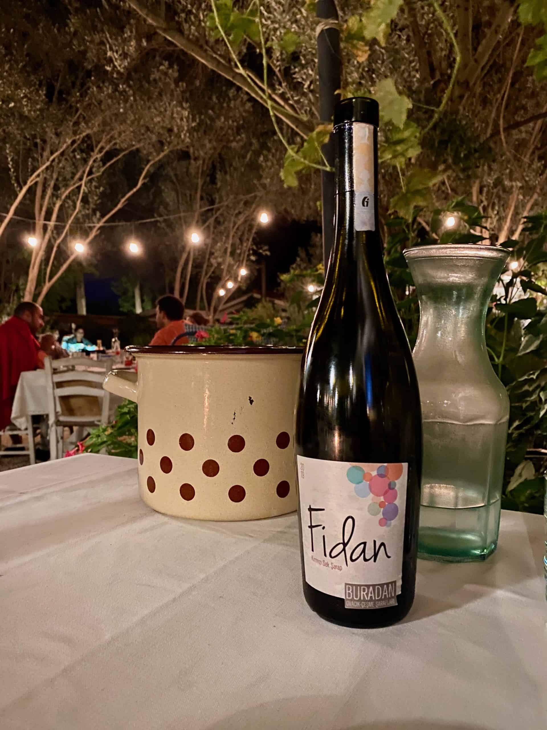Turkish wine bottle at a dinner table in Alaçatı